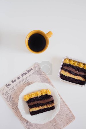 Photo for Delicious chocolate cake with mug of coffee. Party comfort food concept. - Royalty Free Image