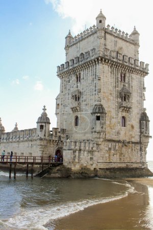 Photo for Belem tower and wooden pier during day in Lisbon, Portugal - Royalty Free Image