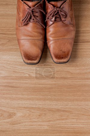 Photo for Men's leather shoes on a wooden background. - Royalty Free Image