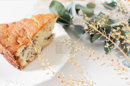 Photo for Breakfast composition with a piece of cake on white background. Morning routine concept. - Royalty Free Image