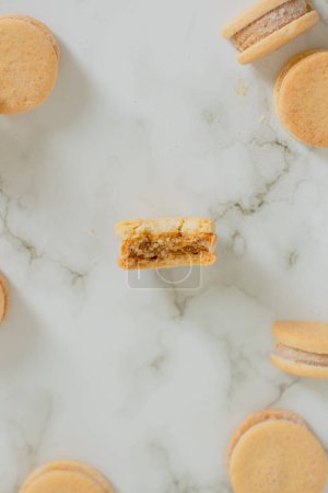 Photo for Beige biscuits on white background. Minimalist composition. - Royalty Free Image