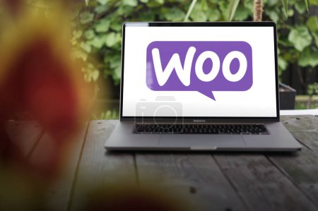 Photo for WROCLAW, POLAND - SEPTEMBER 14, 2023:WooCommerce logo, an open-source e-commerce plugin for WordPress, displayed on a MacBook Pro screen - Royalty Free Image