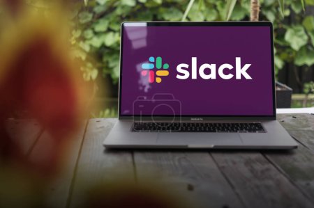 Photo for WROCLAW, POLAND - OCTOBER 2, 2023:Slack logo, a cloud-based freemium cross-platform instant messaging service, displayed on a MacBook Pro screen - Royalty Free Image