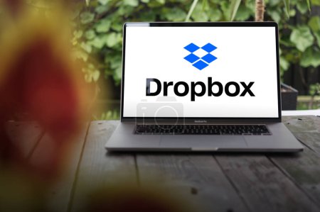 Photo for WROCLAW, POLAND - SEPTEMBER 14, 2023:Dropbox logo, a file hosting service operated by the American company Dropbox, Inc., displayed on a MacBook Pro screen - Royalty Free Image