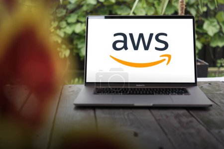 Photo for WROCLAW, POLAND - SEPTEMBER 14, 2023:AWS logo (Amazon Web Services), a subsidiary of Amazon that provides on-demand cloud computing platforms and APIs, displayed on a MacBook Pro screen - Royalty Free Image