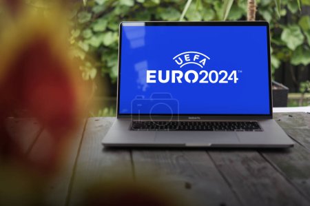 Photo for WROCLAW, POLAND - SEPTEMBER 14, 2023:UEFA Euro 2024 Germany logotype displayed on a MacBook Pro screen - Royalty Free Image
