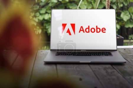 Photo for WROCLAW, POLAND - SEPTEMBER 14, 2023:Adobe logo, American computer software company (Adobe Photoshop, Adobe Illustrator, Adobe Acrobat, Adobe Creative Suite, PDF), displayed on a MacBook Pro screen - Royalty Free Image