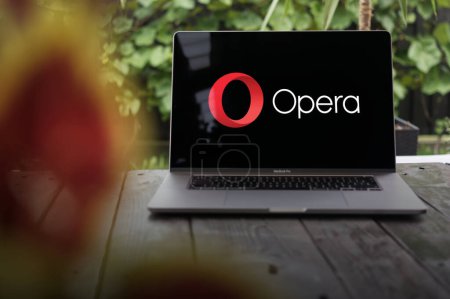 Photo for WROCLAW, POLAND - SEPTEMBER 14, 2023:Opera logo, multi-platform web browser, displayed on a MacBook Pro screen - Royalty Free Image