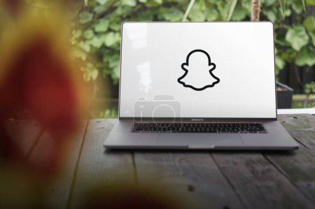 Photo for WROCLAW, POLAND - SEPTEMBER 14, 2023:Snapchat logo, American multimedia instant messaging app and service, displayed on a MacBook Pro screen - Royalty Free Image