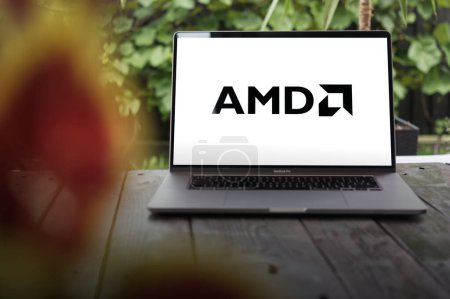 Photo for WROCLAW, POLAND - NOVEMBER 22, 2023:AMD logo (Advanced Micro Devices), company that develops computer processors and related technologies, displayed on MacBook Pro screen - Royalty Free Image