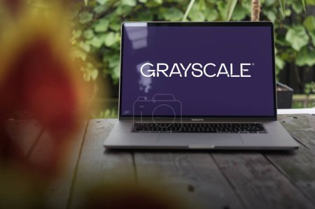 Photo for WROCLAW, POLAND - NOVEMBER 22, 2023:Grayscale logo, the worlds leading crypto asset manager, displayed on MacBook Pro screen - Royalty Free Image