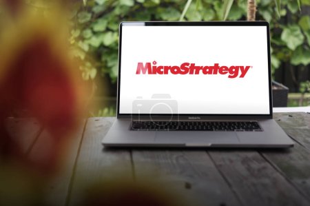 Photo for WROCLAW, POLAND - NOVEMBER 22, 2023:MicroStrategy logo, American company that provides business intelligence (BI), mobile software, and cloud-based services, displayed on MacBook Pro screen - Royalty Free Image