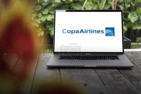 Photo for WROCLAW, POLAND - NOVEMBER 29, 2023:Copa Airlines logo (Compaa Panamea de Aviacin), flag carrier of Panama, displayed on MacBook Pro screen - Royalty Free Image