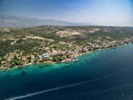 Photo for Aerial view of Stara Novalja, a village in the cove of the same name on the Pag Island, Croatia - Royalty Free Image