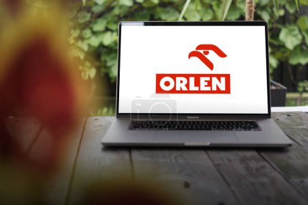 Photo for WROCLAW, POLAND - FEBRUARY 23, 2024:Orlen logo, Polish multinational oil refiner and petrol retailer, displayed on MacBook Pro screen - Royalty Free Image