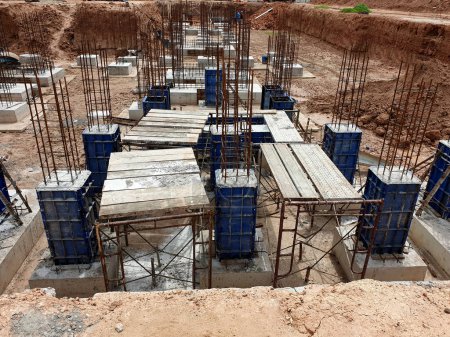 Photo for Construction of Substation: spread footings foundation of 115kV electrical equipment in the switchyard, such as Circuit breaker, Disconnector switch, Current Transformer, Voltage Transformer - Royalty Free Image