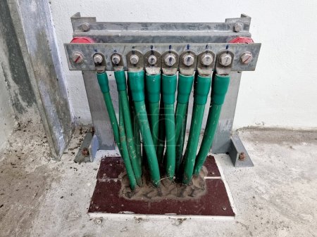 Photo for All equipment ground wires connected to the earthing bus bar in the switchgear room of the control building - Royalty Free Image
