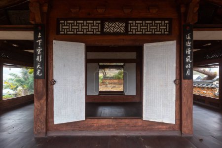 the floor and windows of a traditional Korean house