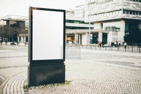 Photo for A Lisbon mock-up features an empty customization space on the sidewalk near a building in Parque das Nacoes, offering ample copy space. The urban setting provides a modern backdrop for the mock-up - Royalty Free Image