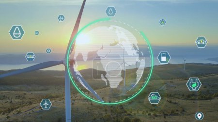 Luftaufnahme einer Windkraftanlage bei Sonnenuntergang mit Animation des Planeten Erde Globus und grünen Technologien für nachhaltige Entwicklung
