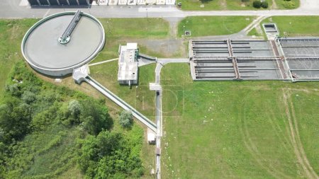 Aerial view of water cleaner plant purification system with big steel tank and pipeline for drinkable water supply