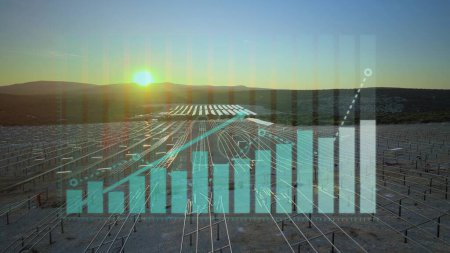 Photo for Progression Graph Over New Unfinished Solar Photovoltaic Field At Sunset. Aerial drone shot with graphic - Royalty Free Image