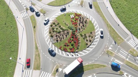 Photo for Dutch-style roundabout with cycle and pedestrian zebra crossings, aerial view - Royalty Free Image