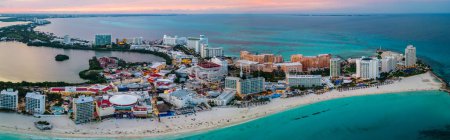 Photo for Aerial View Over the Cancun Coastline Beachfront with Hotels and Resorts. Tourist Destination for Vacation and Holidays in Mexico's Famous Landmarks. Scenic Views Overlooking Tropical Paradise. - Royalty Free Image