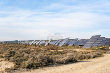 Harnessing the Desert Sun: Vast Solar Panel Array in Semi-Arid Landscape.