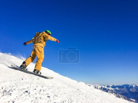 Photo for Snowboarder freerider in high mountains - Royalty Free Image