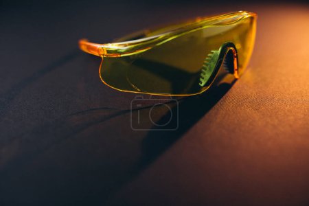 Photo for Personal safety equipment eyeglasses isolated on black background - Royalty Free Image