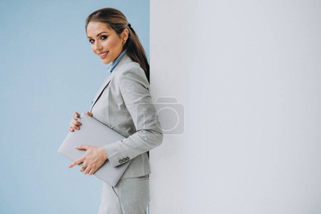 Photo for Young business woman standing in the office isolated - Royalty Free Image