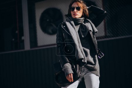 Photo for Young woman model in leather jacket outside the street - Royalty Free Image