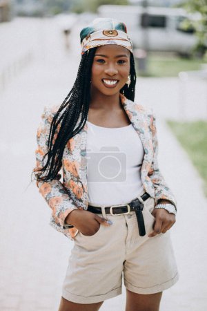 Photo for Stylish african american woman in the park - Royalty Free Image