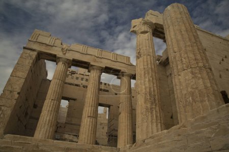 Photo for ATHENS, GREECE. 25 OCTOBER  2021. View of the columns of the monumental Propylaea gate in Acropolis, Athens, Greece. - Royalty Free Image