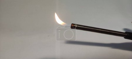 Photo for Close up flame from torch on isolated white background - Royalty Free Image