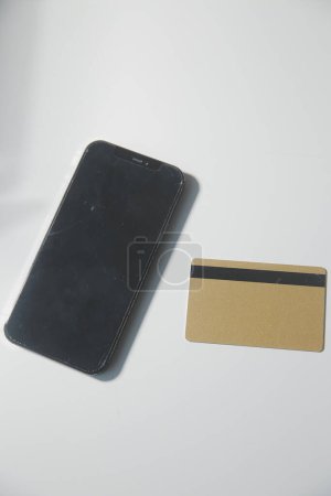 Photo for Calculator on a dark background, plastic cards and banknotes - Royalty Free Image