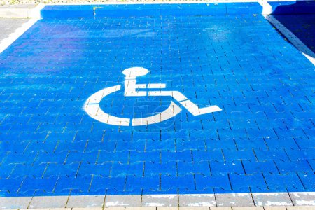Photo for Wheelchair blue parking spot - Royalty Free Image