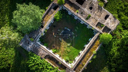 An aerial view of the ruins of the Nazi temple Mausoleum in the forest of the city Walbrzych in Poland