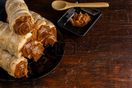 Téléchargez les photos : Canons Dulce de leche, dessert argentin typique vendu dans les boulangeries. - en image libre de droit