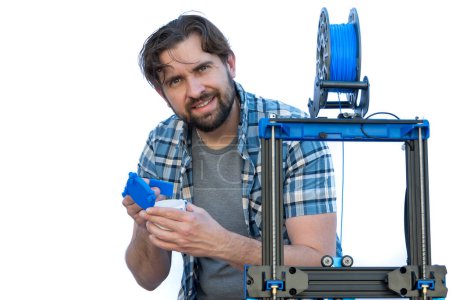 Photo for Man doing 3D printing work. Toung entrepreneur 3d. - Royalty Free Image