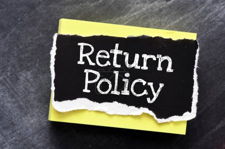 Photo for RETURN POLICY words on a black piece of paper - Royalty Free Image