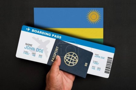 Téléchargez les photos : Passeport, carte d'embarquement et drapeau du Rwanda - en image libre de droit