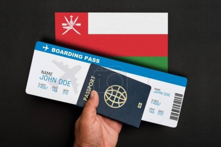 Téléchargez les photos : Passeport, carte d'embarquement et drapeau d'Oman - en image libre de droit