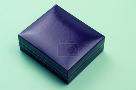 Blue leather box isolated on blue background.