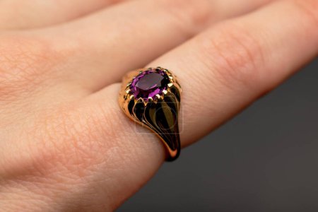 Beautiful ring on hand close-up, shallow depth of field