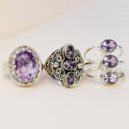 jewelry ring with purple amethyst isolated on white background.