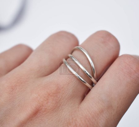 Wedding ring on a white background. Close-up.