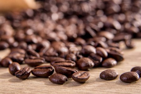 Coffee beans macro,wooden,black coffee