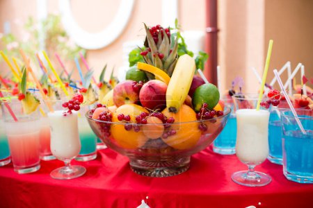 Fruits and cocktails on a bar